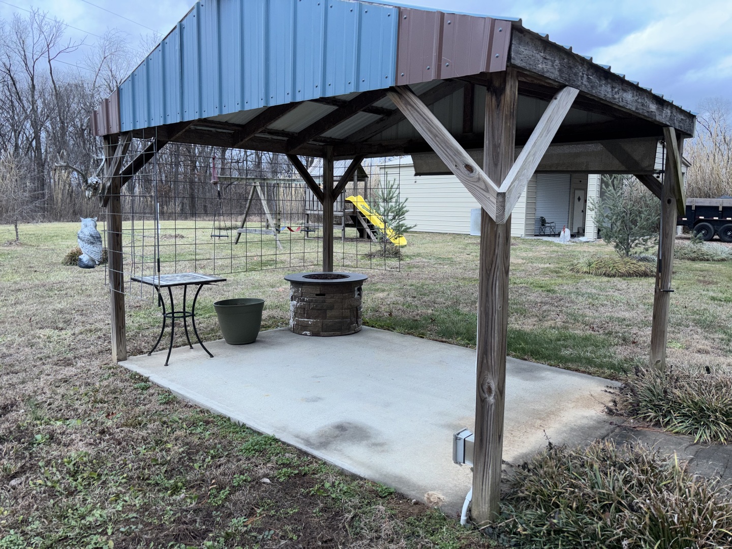 255 Twin Springs Loop Anna, IL 62906 - Photo 40 of 48 a view of a house with backyard and sitting area