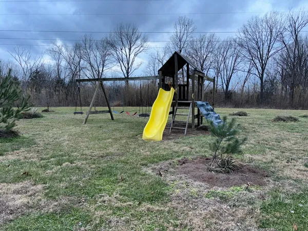 a view of a park with a slide