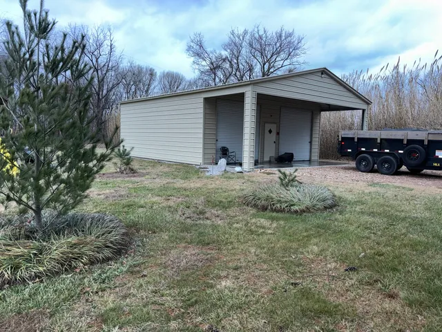a house with trees in front of it