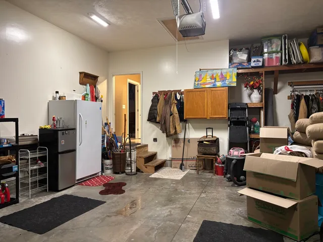 a room with furniture and a book shelf