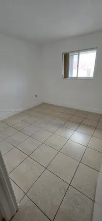 a view of a room and window