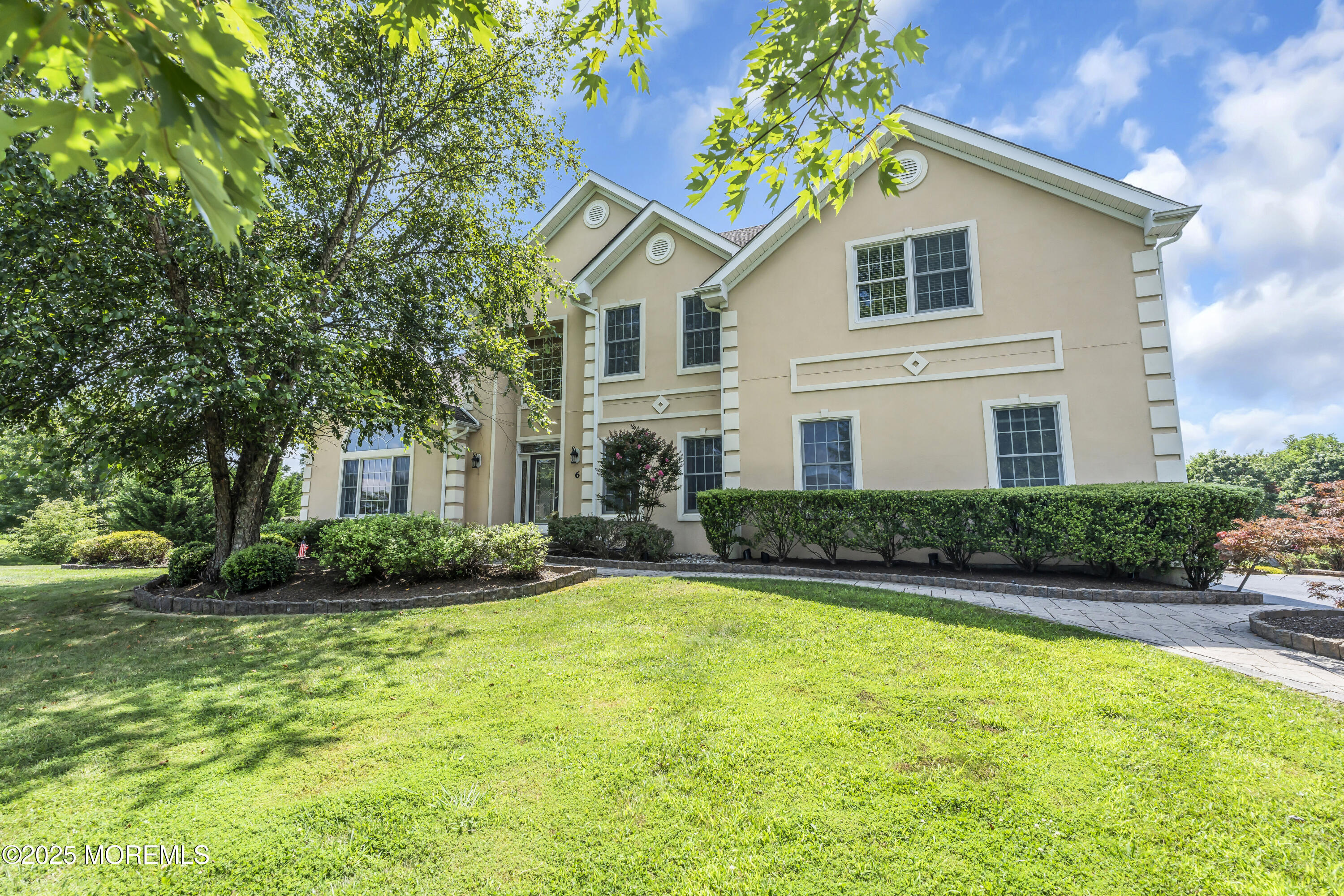 6 Cooper Court Cream Ridge, NJ 08514 - Photo 1 of 105 a front view of a house with a yard and garage