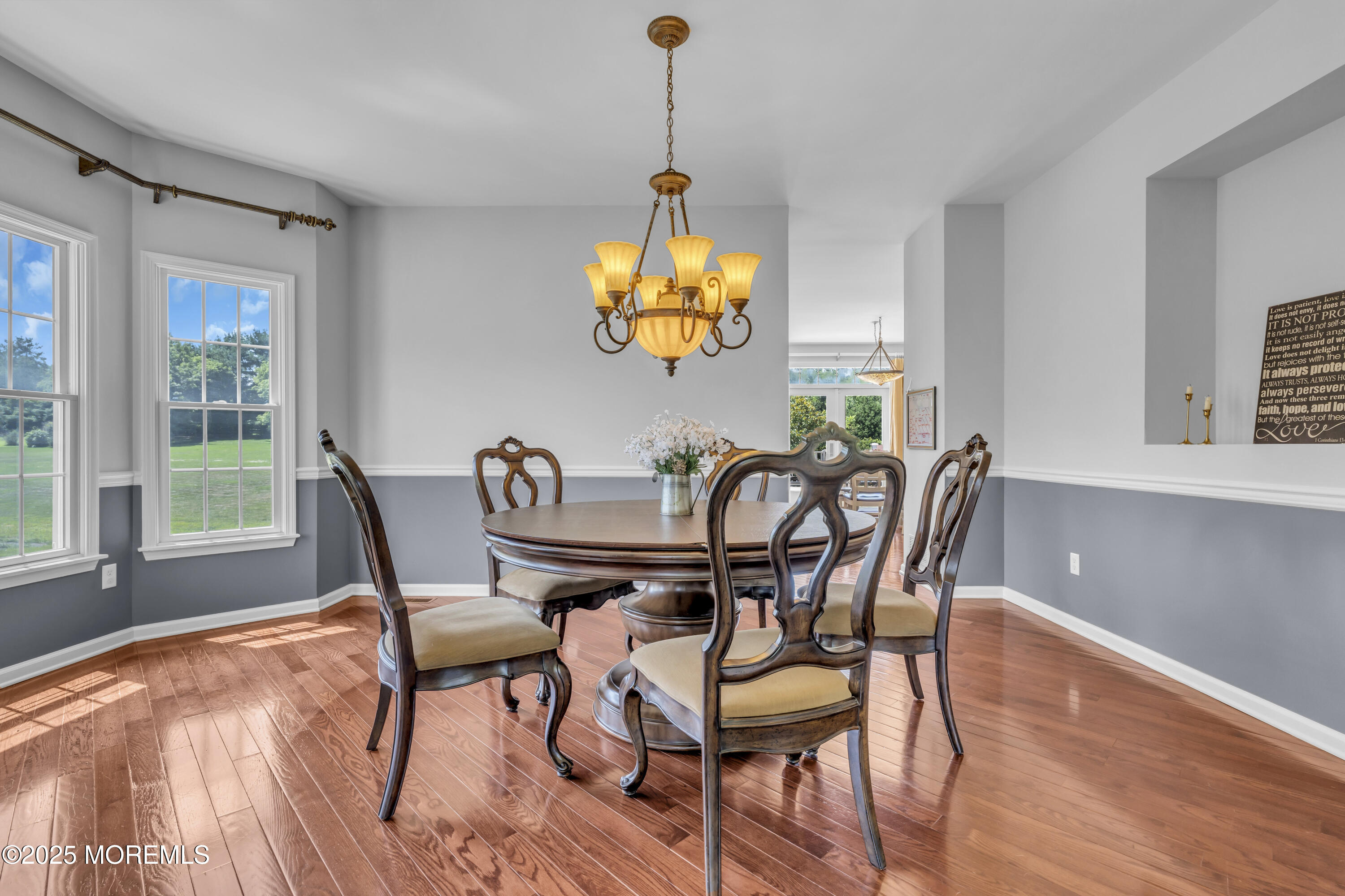 6 Cooper Court Cream Ridge, NJ 08514 - Photo 15 of 105 a dining room with furniture a chandelier and wooden floor