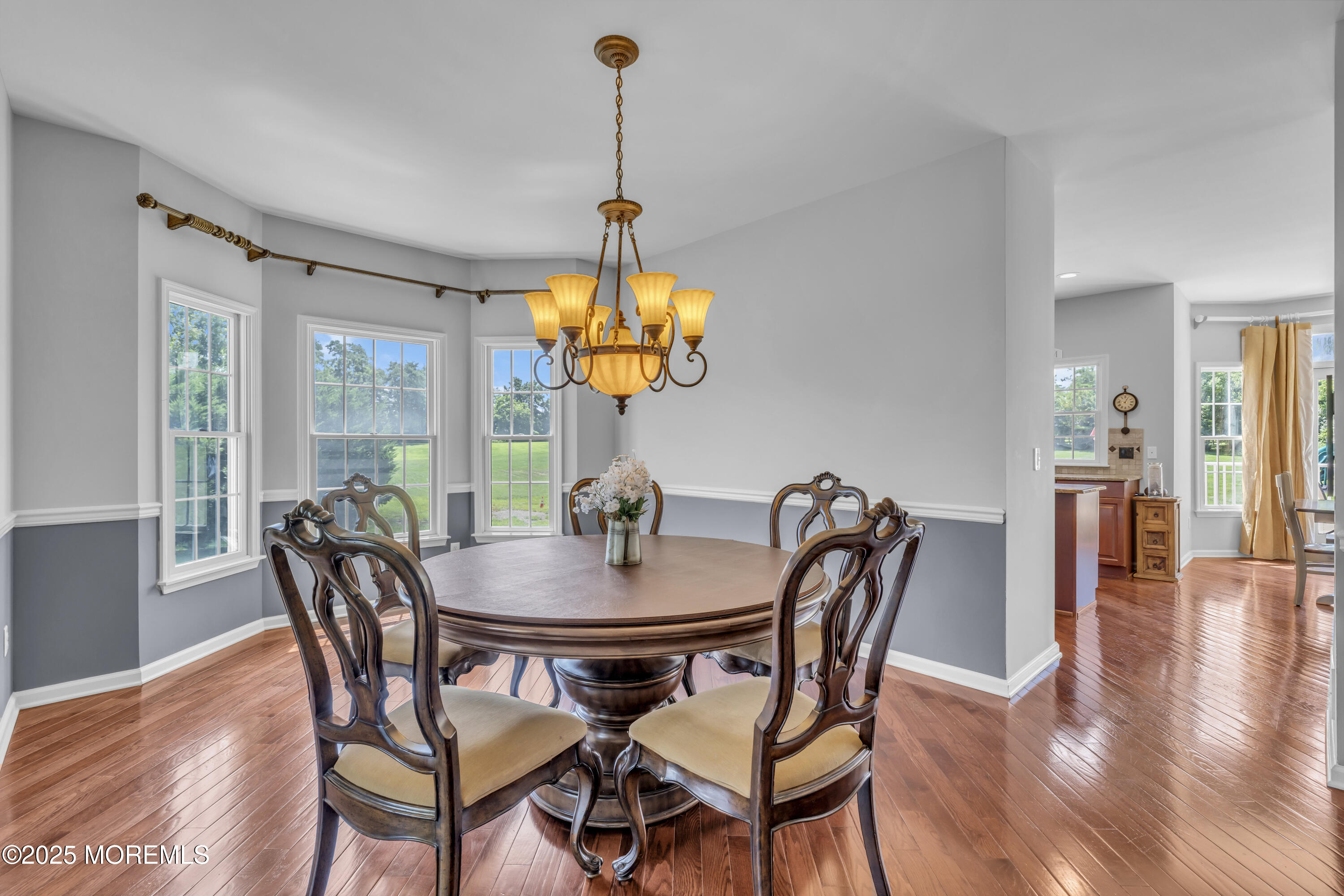 6 Cooper Court Cream Ridge, NJ 08514 - Photo 17 of 105 a dining room with furniture a chandelier and wooden floor