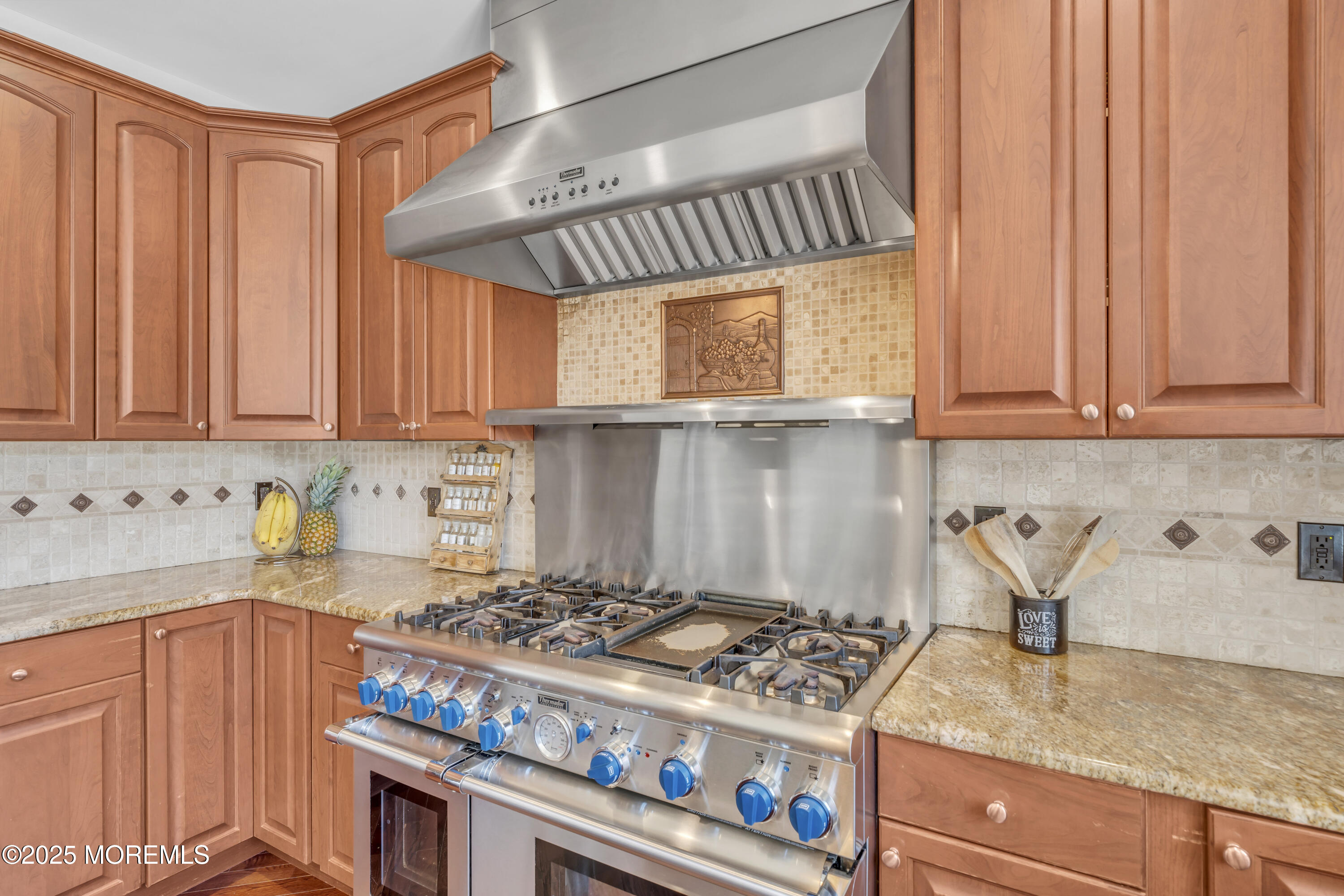 6 Cooper Court Cream Ridge, NJ 08514 - Photo 21 of 105 a kitchen with stainless steel appliances granite countertop a stove a sink dishwasher and cabinets with wooden floor