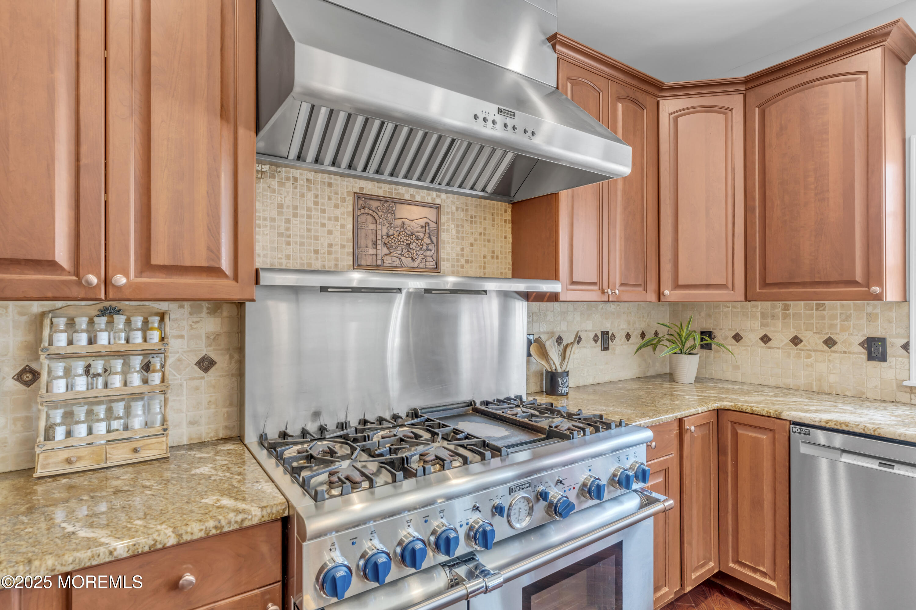 6 Cooper Court Cream Ridge, NJ 08514 - Photo 22 of 105 a kitchen with stainless steel appliances granite countertop a stove a sink and a microwave