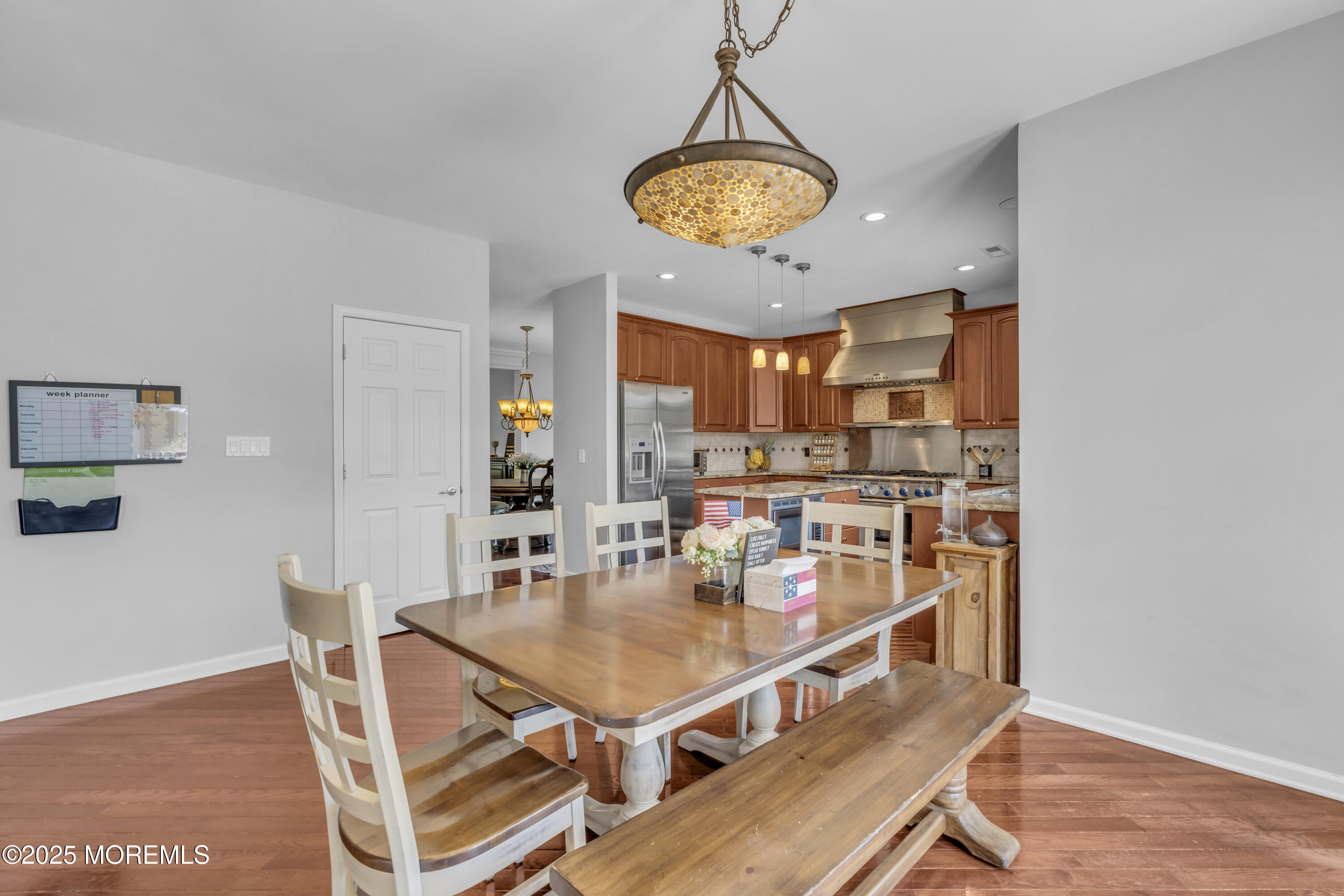 6 Cooper Court Cream Ridge, NJ 08514 - Photo 31 of 105 a room with stainless steel appliances kitchen island a table and chairs in it