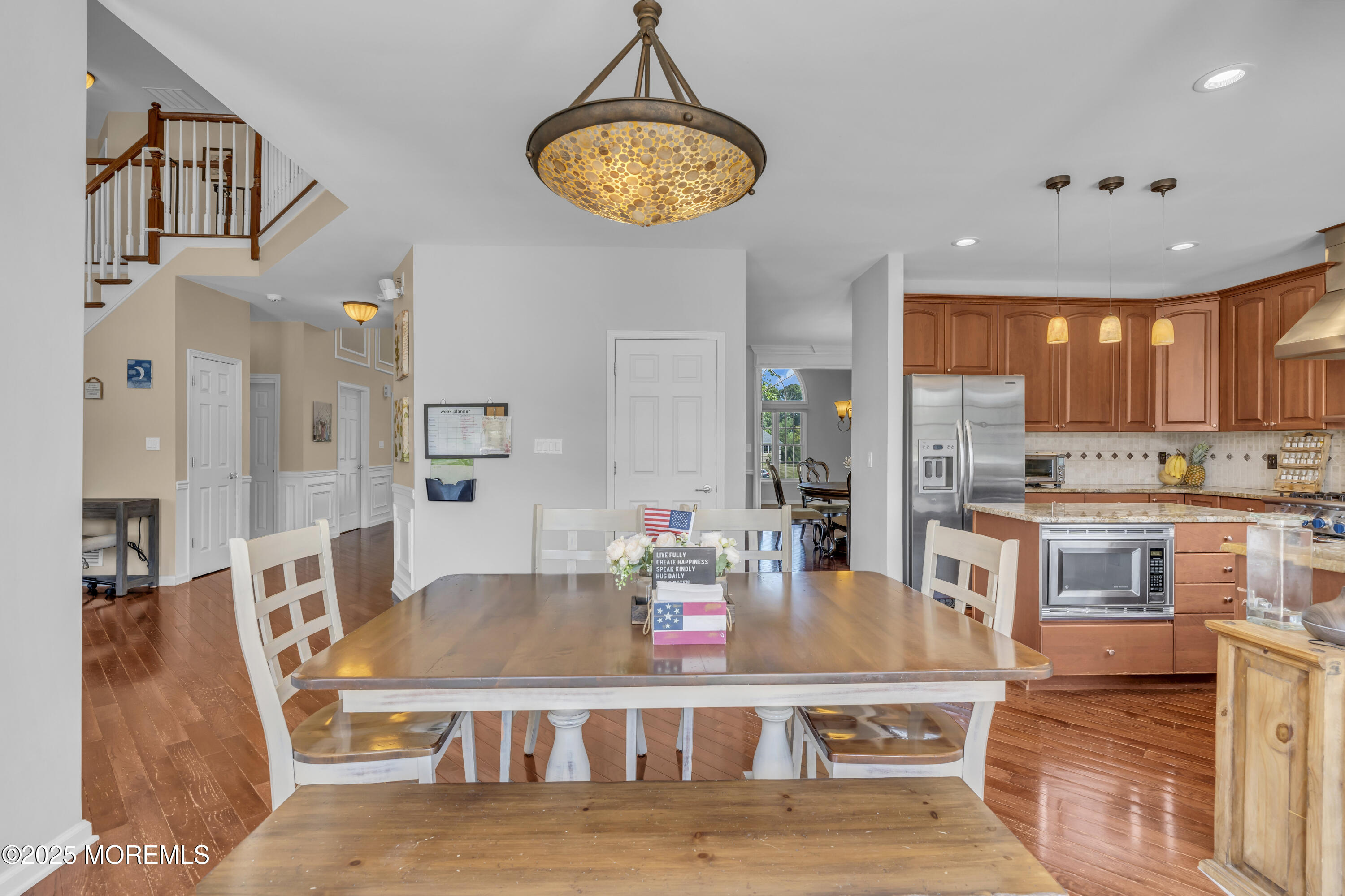 6 Cooper Court Cream Ridge, NJ 08514 - Photo 32 of 105 a living room with stainless steel appliances kitchen island granite countertop furniture and a kitchen view