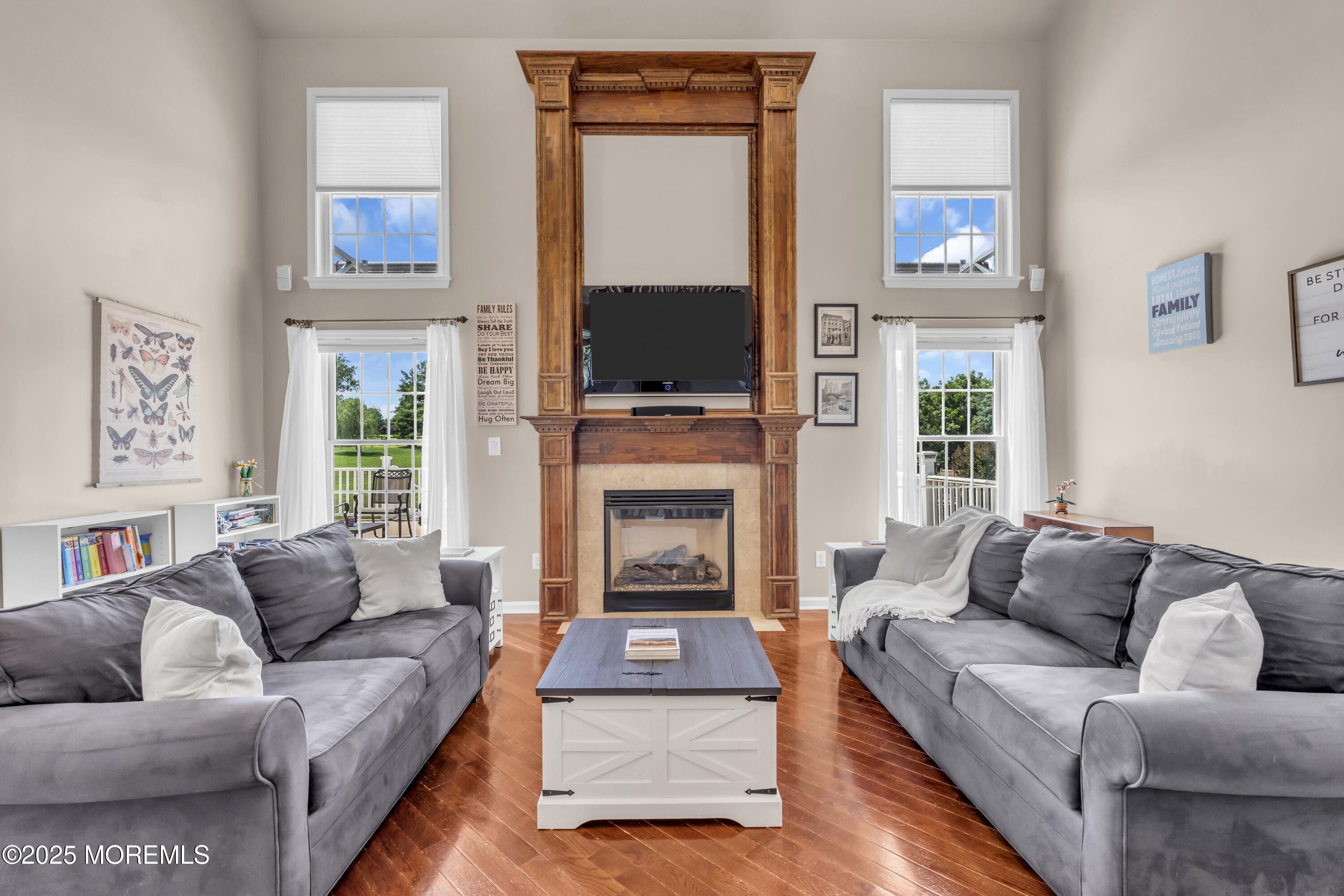 6 Cooper Court Cream Ridge, NJ 08514 - Photo 37 of 105 a living room with furniture and a fireplace