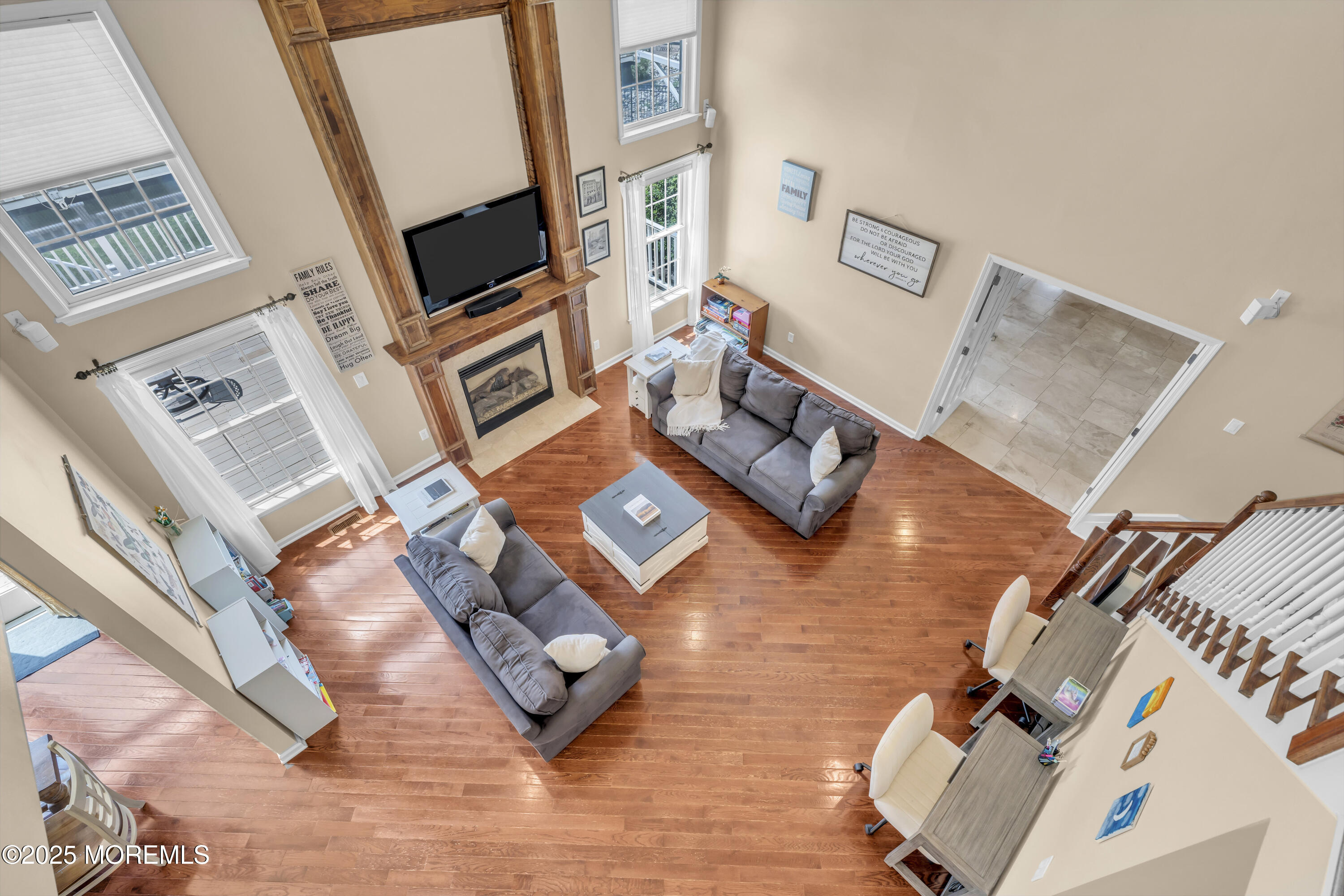 6 Cooper Court Cream Ridge, NJ 08514 - Photo 54 of 105 a living room with furniture and a flat screen tv
