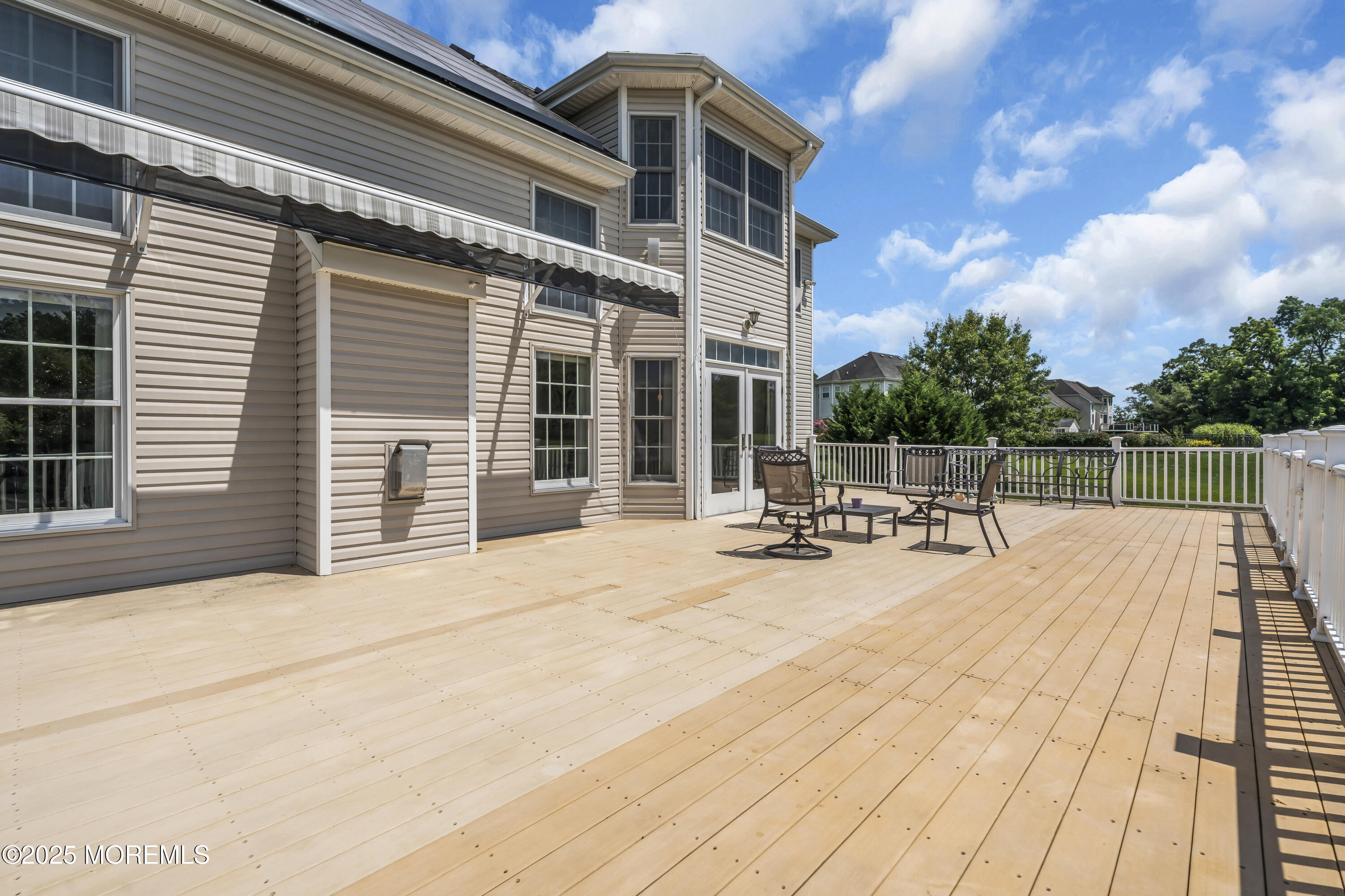 6 Cooper Court Cream Ridge, NJ 08514 - Photo 65 of 105 a view of a house with dining room and wooden fence