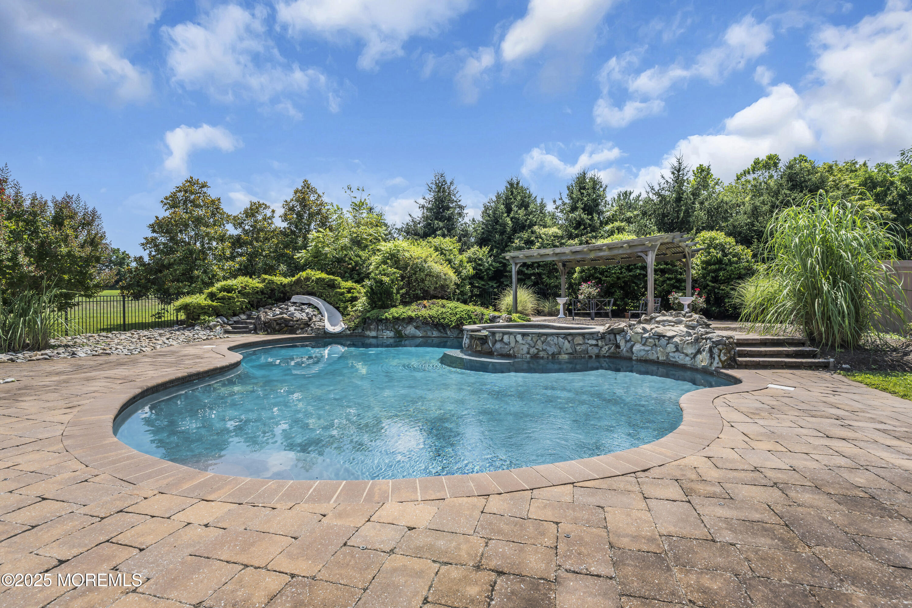 6 Cooper Court Cream Ridge, NJ 08514 - Photo 68 of 105 a view of a swimming pool with a sitting space