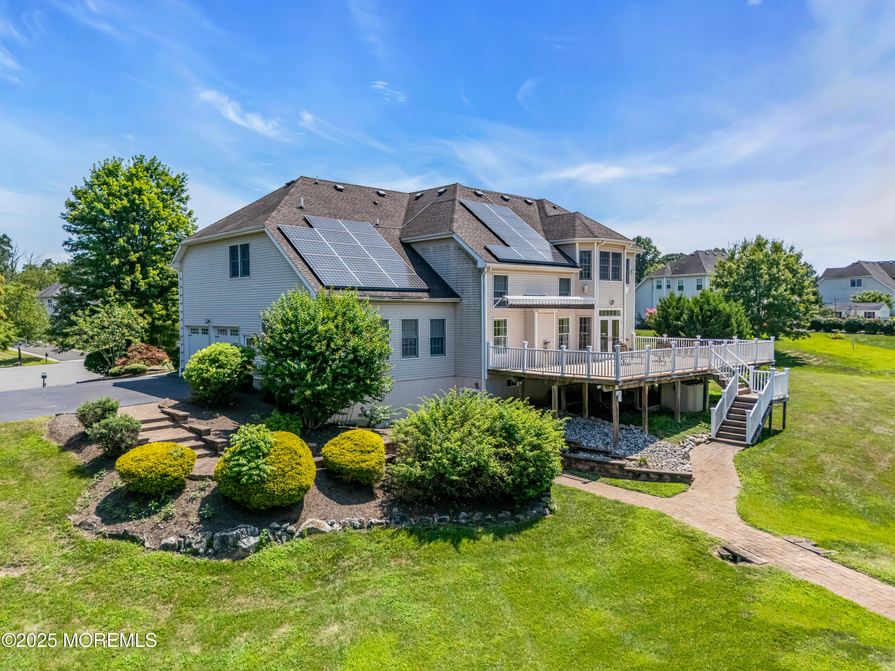 6 Cooper Court Cream Ridge, NJ 08514 - Photo 83 of 105 a view of a house with a big yard potted plants and a large tree
