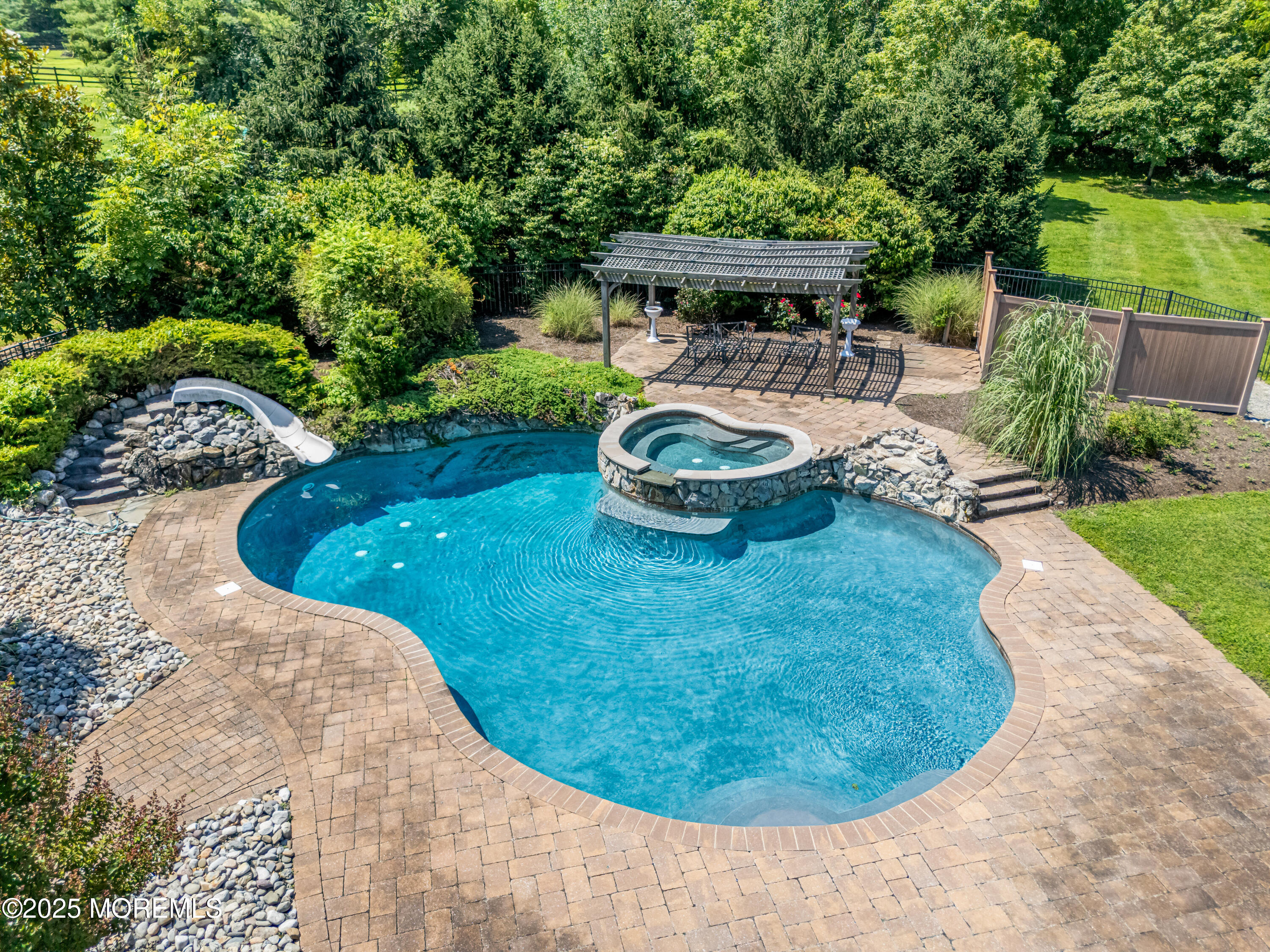 6 Cooper Court Cream Ridge, NJ 08514 - Photo 89 of 105 a view of a swimming pool with outdoor seating