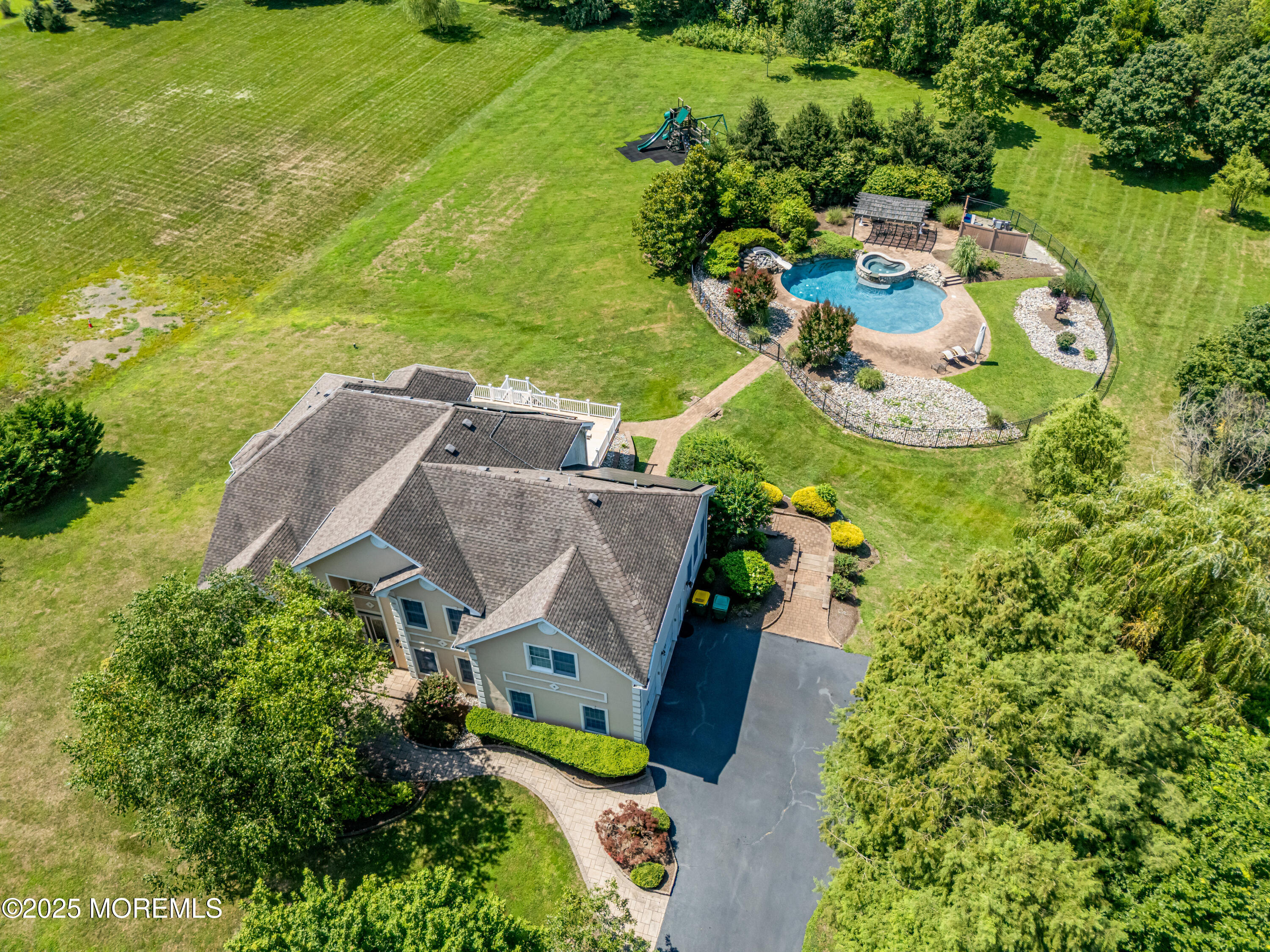 6 Cooper Court Cream Ridge, NJ 08514 - Photo 98 of 105 an aerial view of a house with a garden and lake view