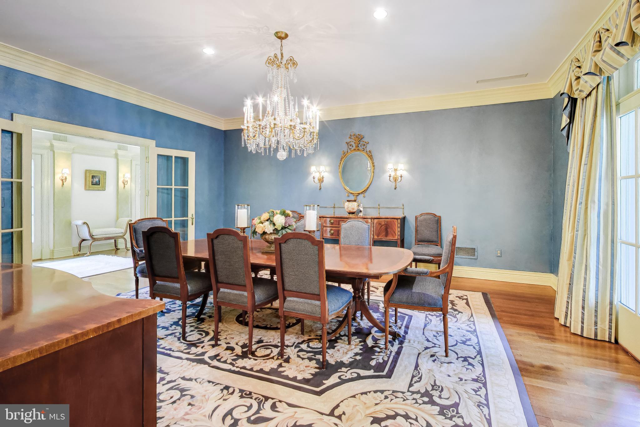 9001 Persimmon Tree Road Potomac, MD 20854 - Photo 13 of 77 a view of a dining room with furniture
