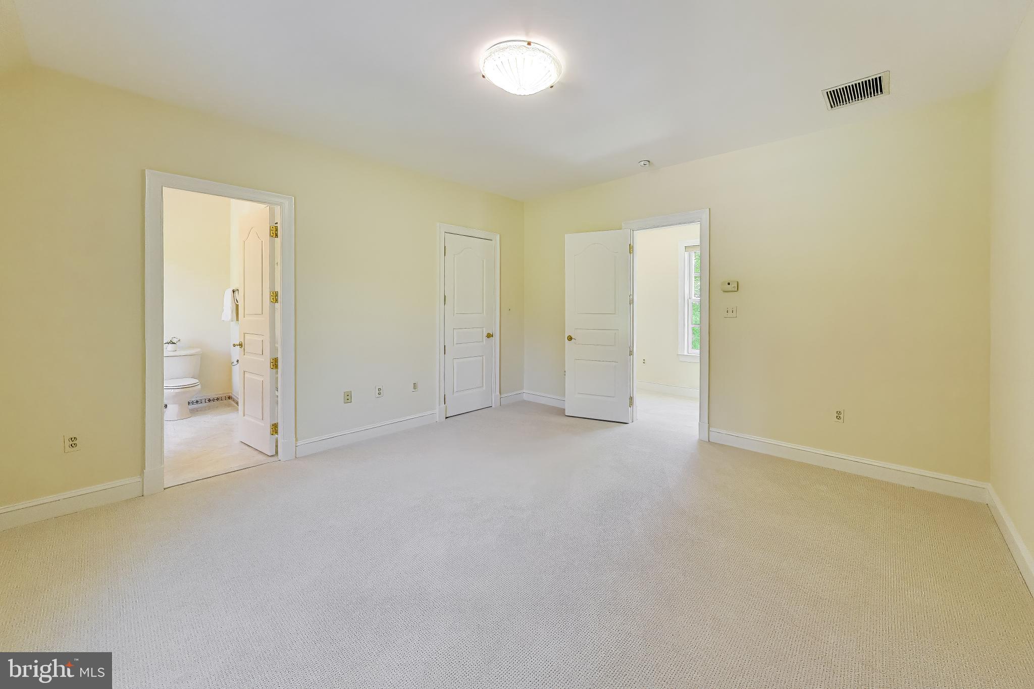 9001 Persimmon Tree Road Potomac, MD 20854 - Photo 43 of 77 an empty room with closet area