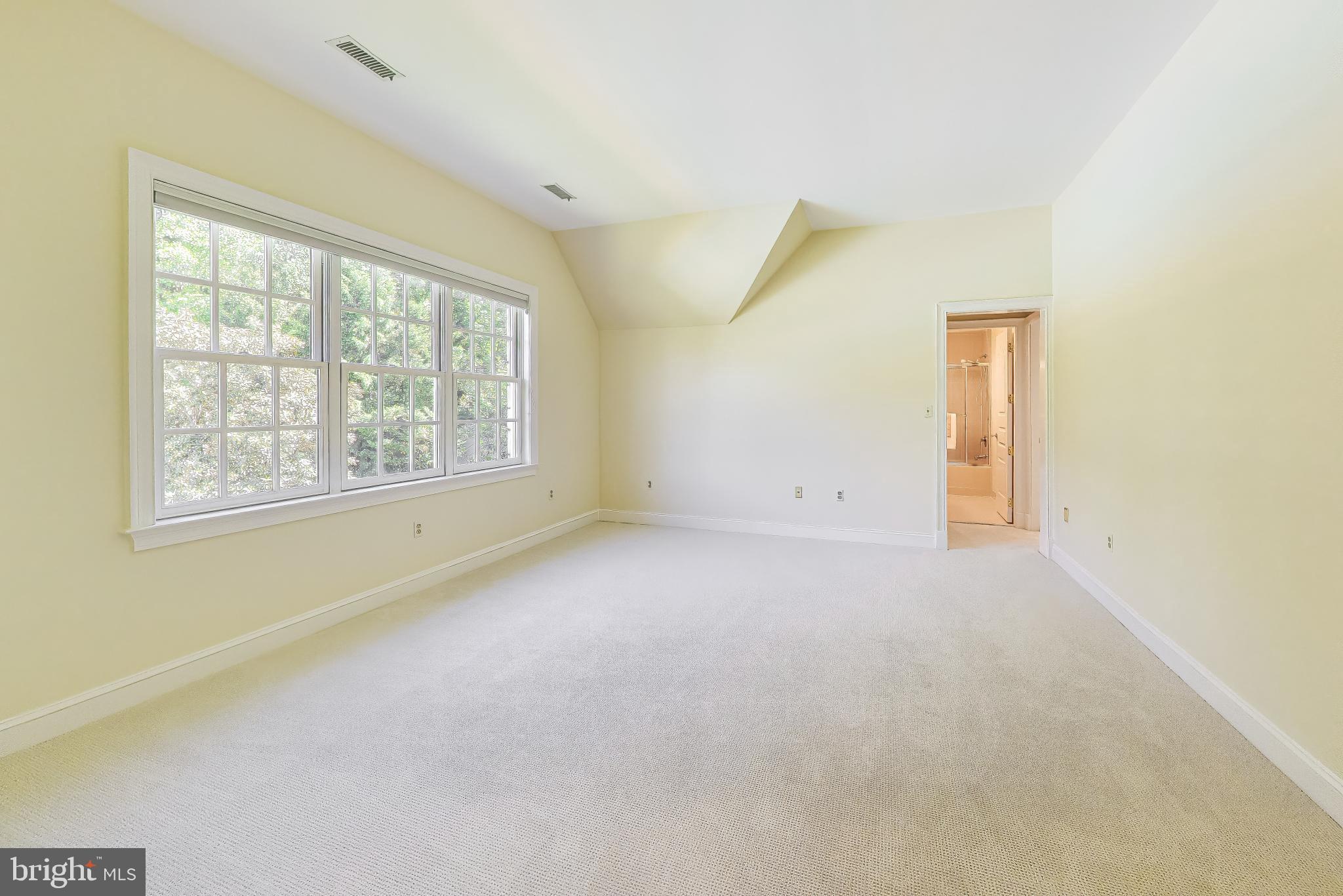 9001 Persimmon Tree Road Potomac, MD 20854 - Photo 49 of 77 an empty room with windows