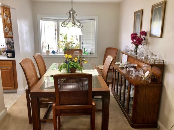204 Beacon Park Road, Unit 204 Webster, MA 01570 - Photo 12 of 29 a view of a dining room with furniture and window