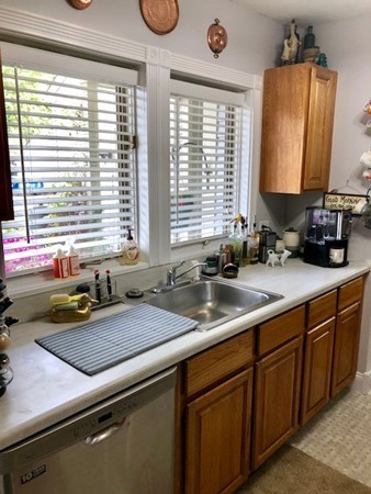 204 Beacon Park Road, Unit 204 Webster, MA 01570 - Photo 7 of 29 a kitchen with a sink and a window