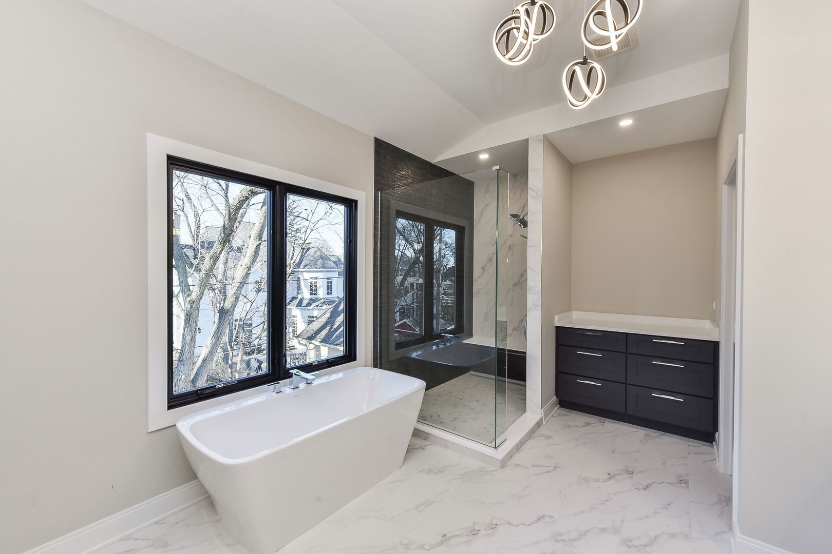 744 Sunset Drive Naperville, IL 60540 - Photo 7 of 18 a living room with furniture and a large window