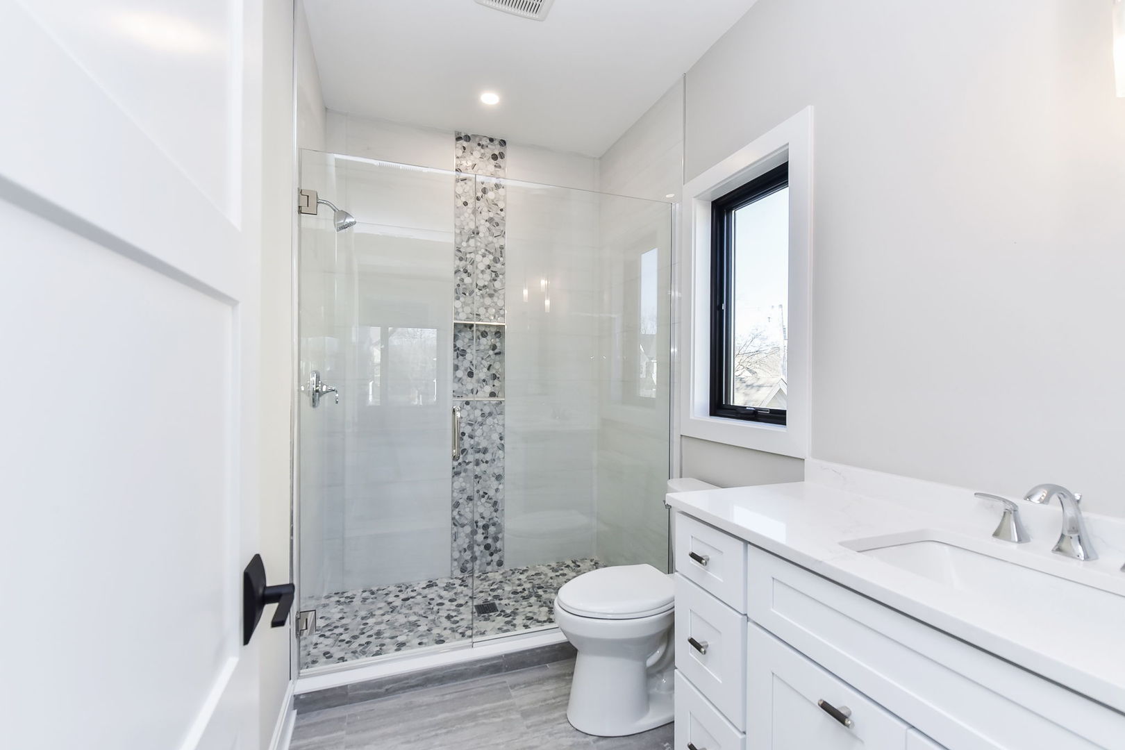744 Sunset Drive Naperville, IL 60540 - Photo 10 of 18 a bathroom with a granite countertop sink a toilet and shower