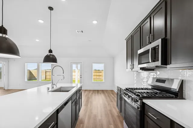 a view of a bathroom from a hallway
