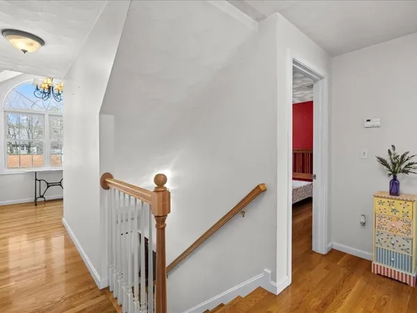 a bed room with a bed and a window