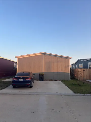 a car parked in front of a house