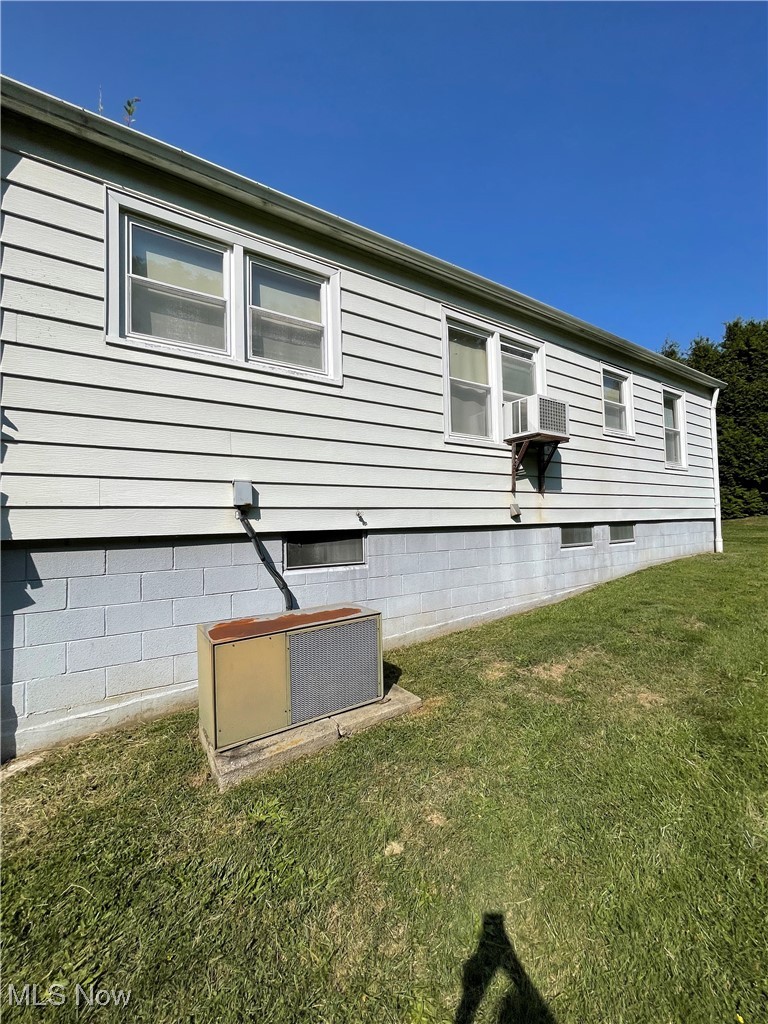 30130 Ridge Road Wickliffe, OH 44092 - Photo 11 of 15 Back of property featuring a yard and central air condition unit