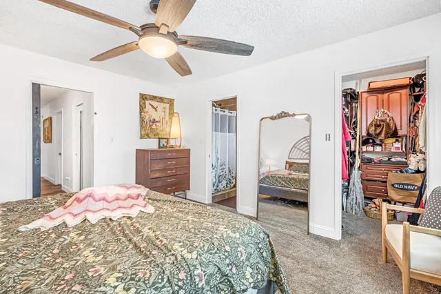 a view of a swimming pool with a lounge chair