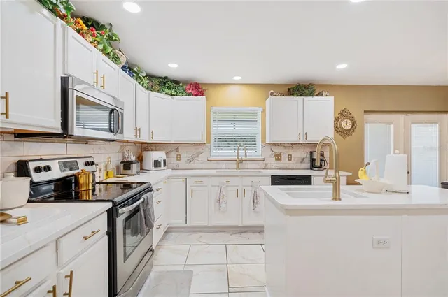 a kitchen with a table and chairs in it