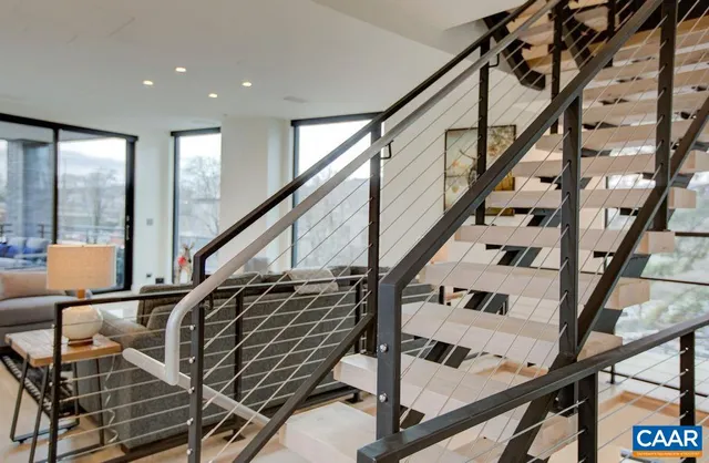 a view of a tall building from a balcony