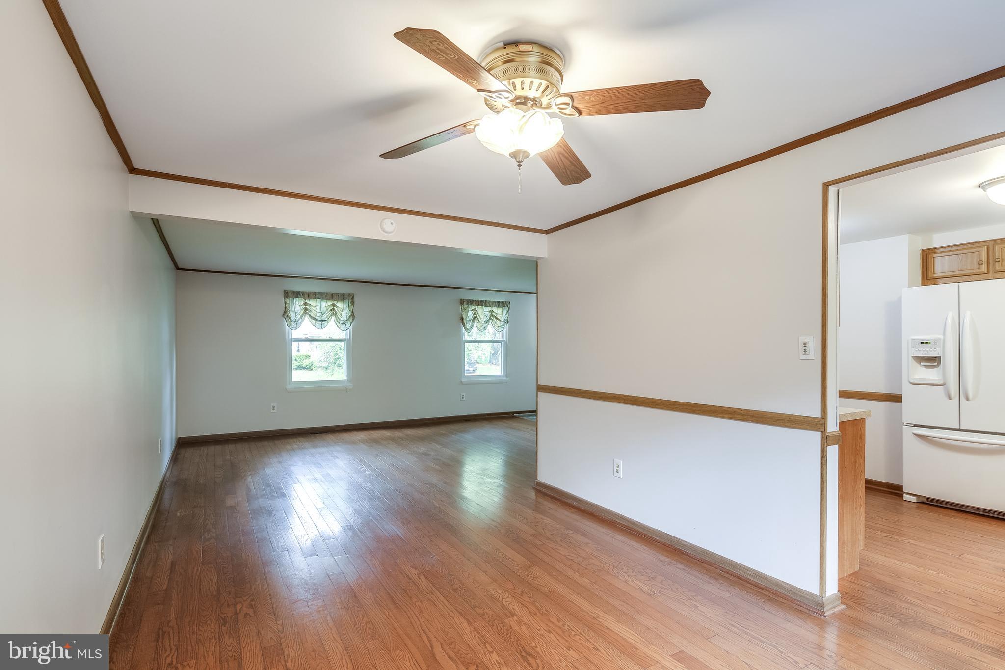 15309 Valencia Street Silver Spring, MD 20905 - Photo 8 of 35 Separate Dining Room w/ molding and chair rail