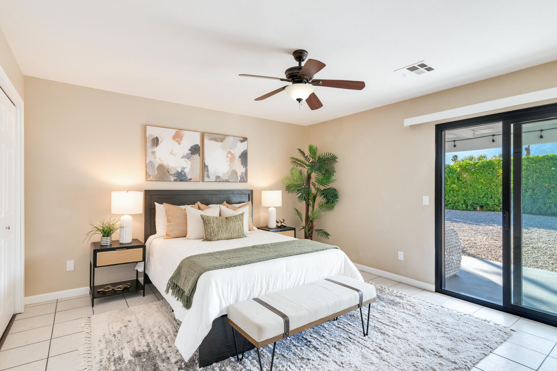 2003 North Sandra Road Palm Springs, CA 92262 - Photo 18 of 25 a bedroom with a large bed and a window