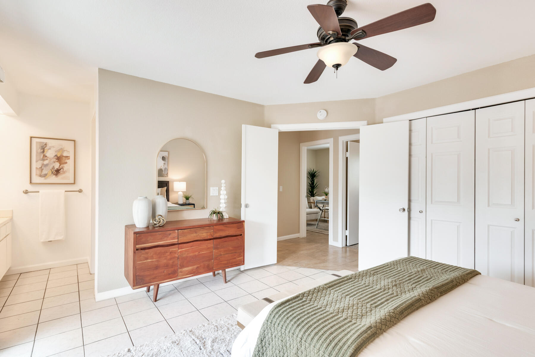 2003 North Sandra Road Palm Springs, CA 92262 - Photo 19 of 25 a bedroom with a bed and a chandelier