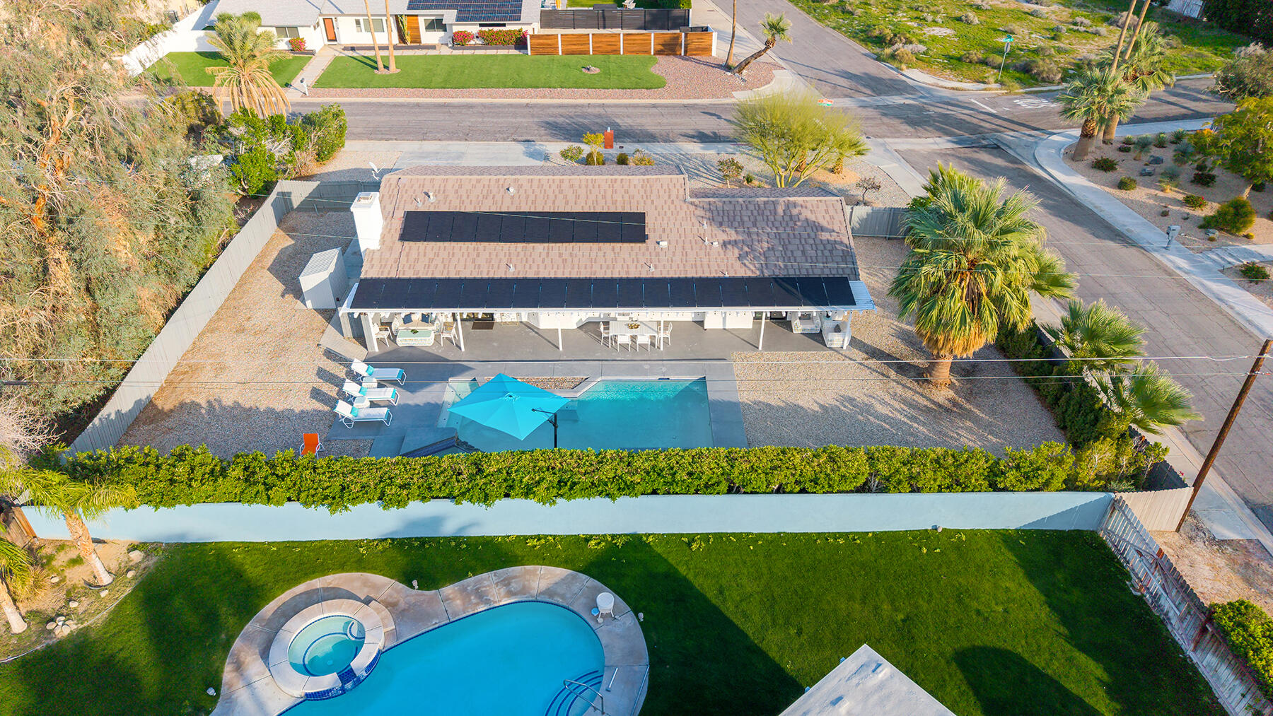 2003 North Sandra Road Palm Springs, CA 92262 - Photo 24 of 25 a picture of a book and a table