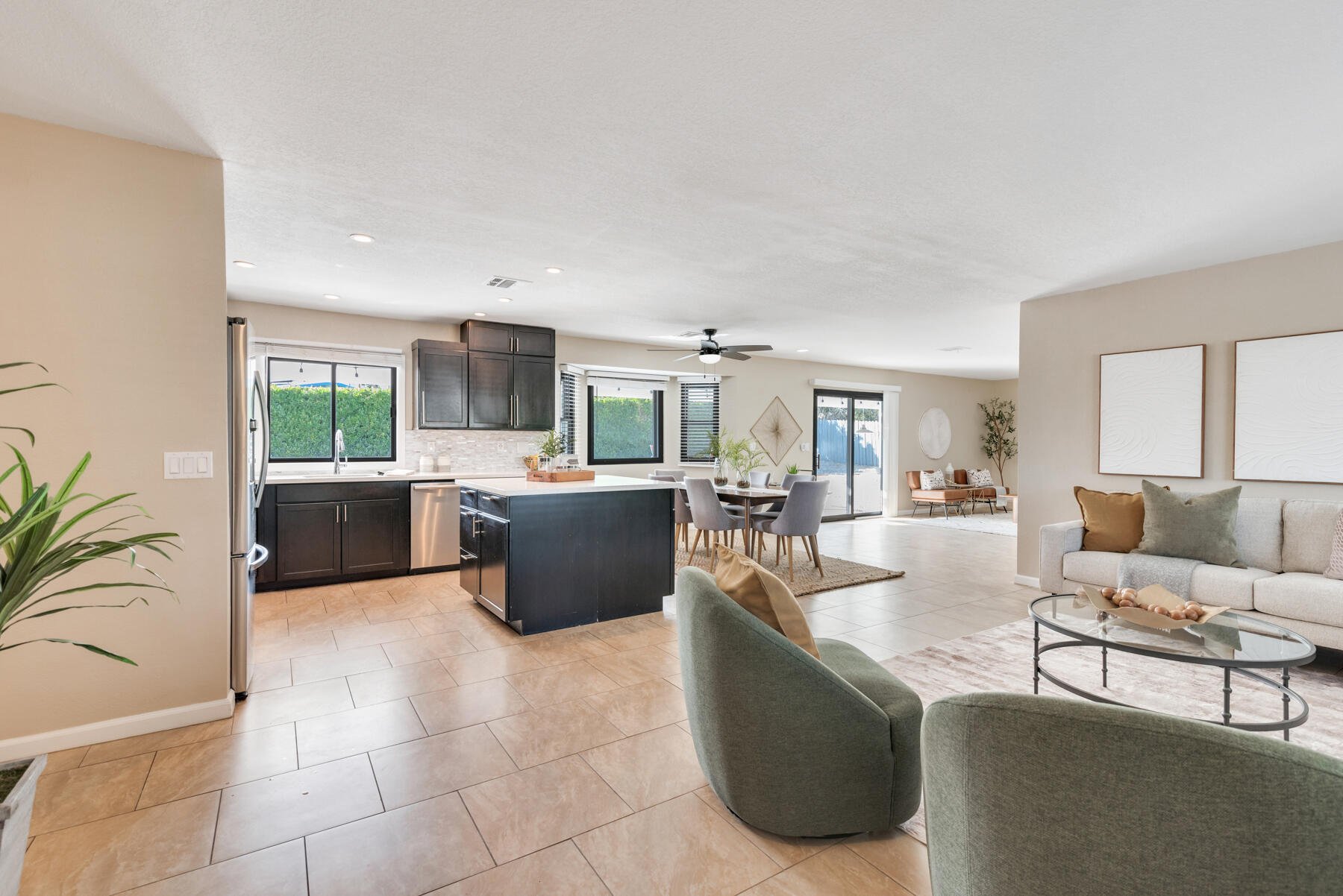 2003 North Sandra Road Palm Springs, CA 92262 - Photo 7 of 25 a living room with furniture a window and kitchen view
