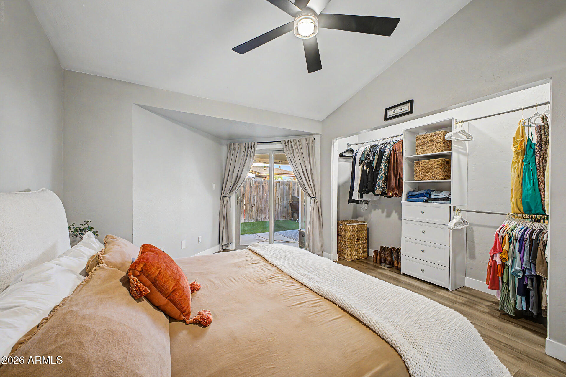 2455 East Broadway Road, Unit 65 Mesa, AZ 85204 - Photo 16 of 36 a bedroom with a bed and a flat tv screen