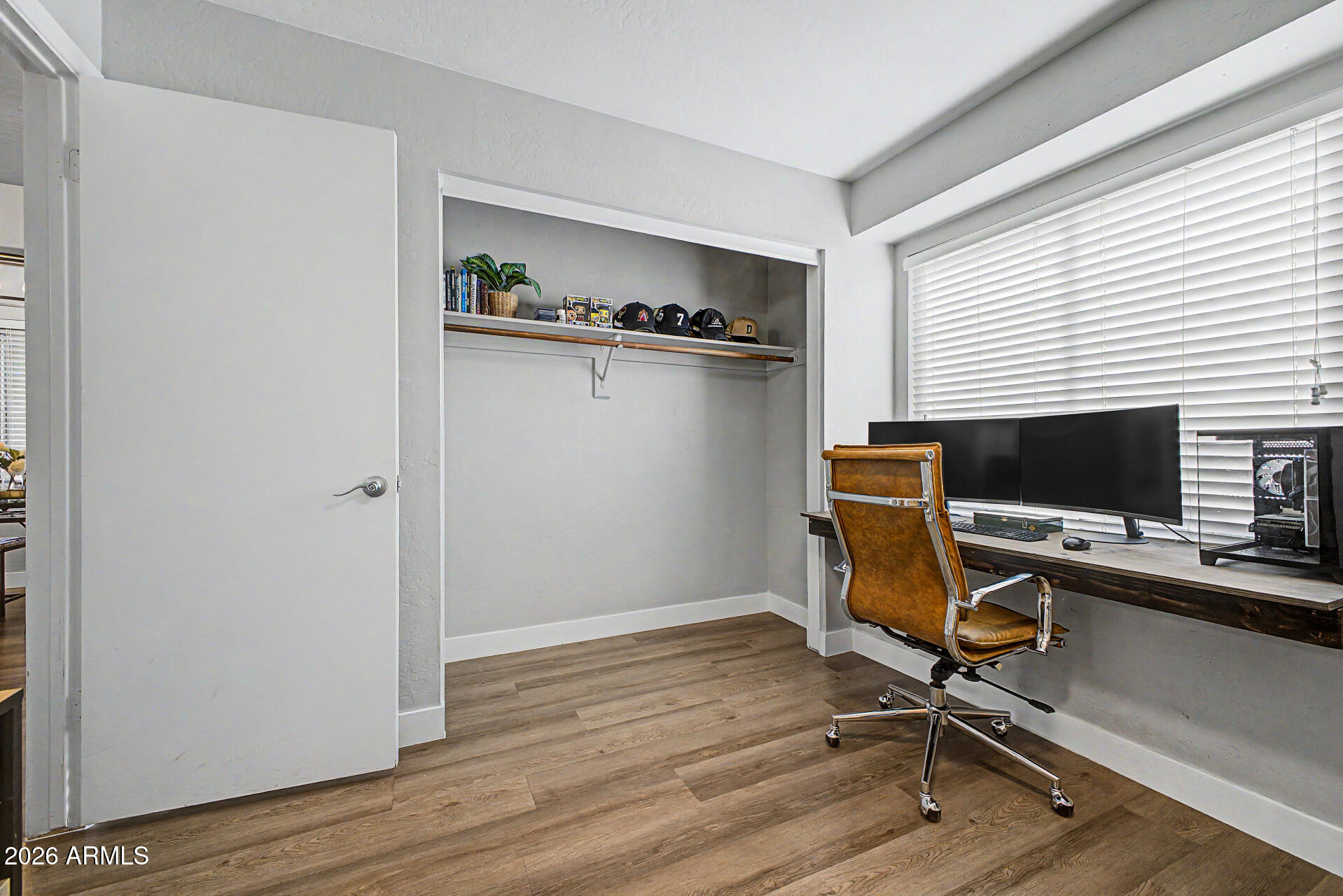2455 East Broadway Road, Unit 65 Mesa, AZ 85204 - Photo 19 of 36 a view of a workspace with furniture and a window