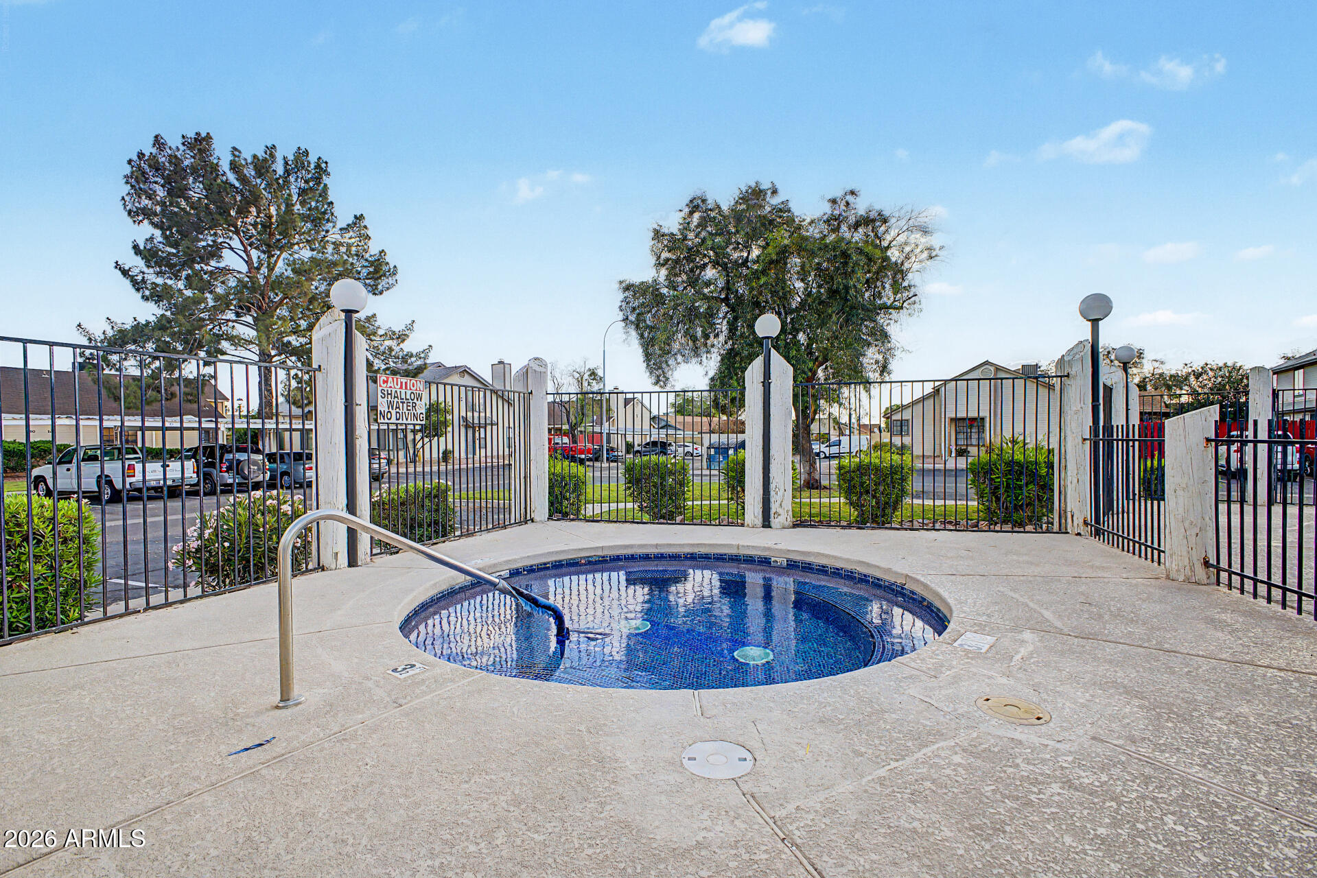 2455 East Broadway Road, Unit 65 Mesa, AZ 85204 - Photo 31 of 36 a view of a swimming pool with a patio