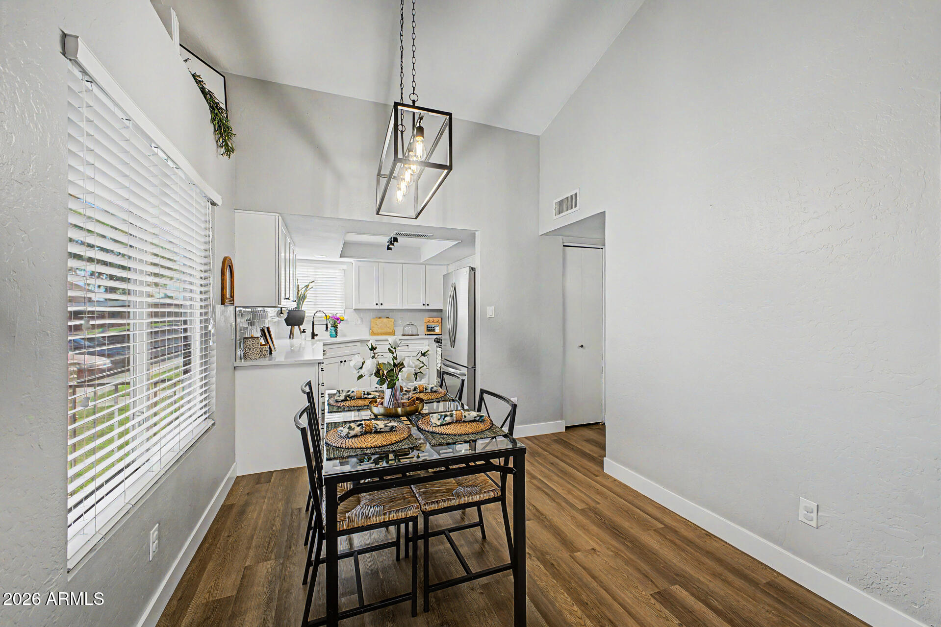 2455 East Broadway Road, Unit 65 Mesa, AZ 85204 - Photo 9 of 36 a view of a dining room with furniture