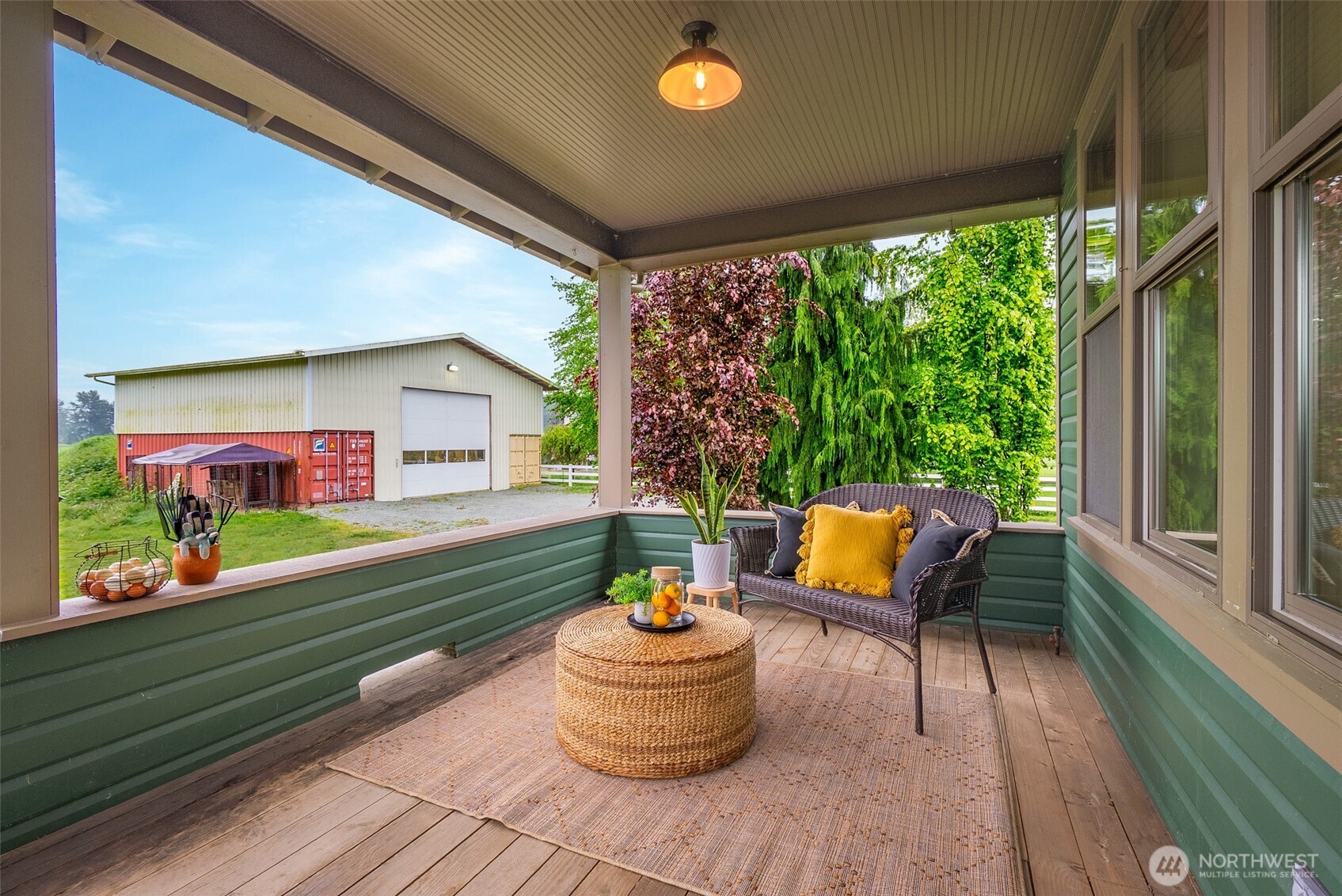 2304 Norman Road Stanwood, WA 98292 - Photo 20 of 39 a outdoor living space with furniture and garden view