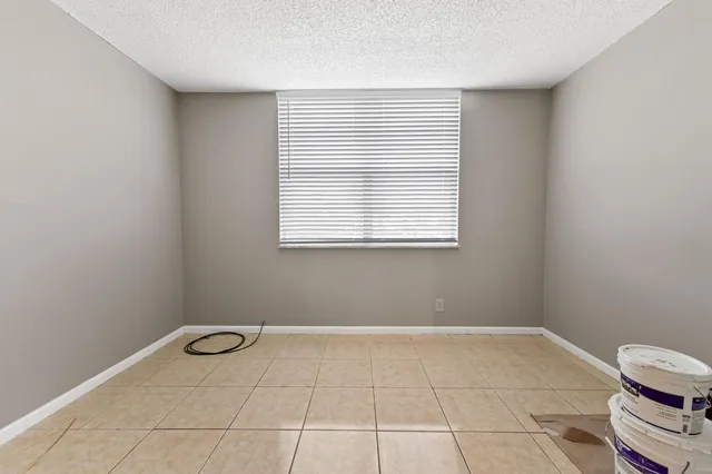 a view of a room with a window