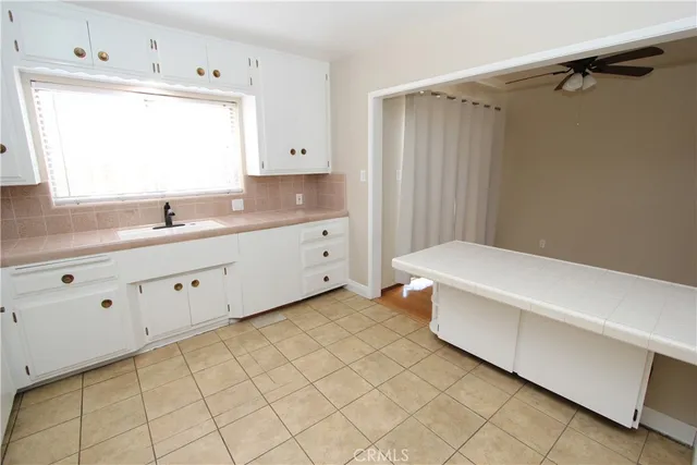 a bathroom with a sink toilet and vanity
