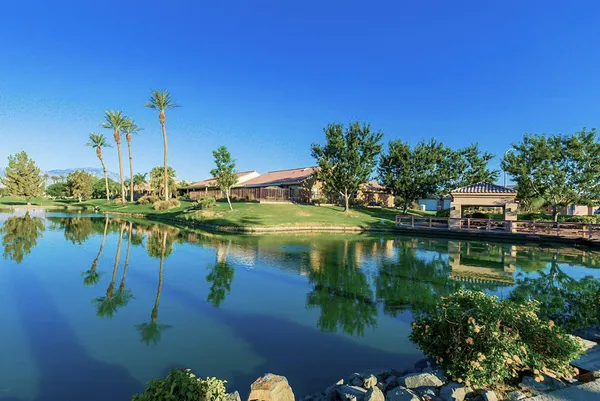 a view of a golf course with a garden