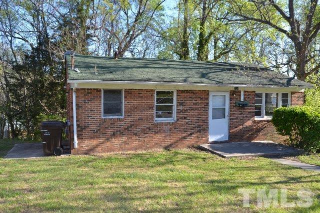 124 Harris Street Roxboro, NC 27573 - Photo 1 of 8 a view of house with front door