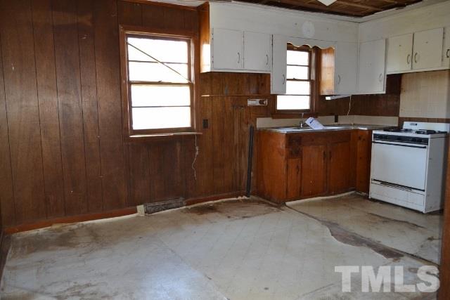 124 Harris Street Roxboro, NC 27573 - Photo 3 of 8 a view of a kitchen with a sink
