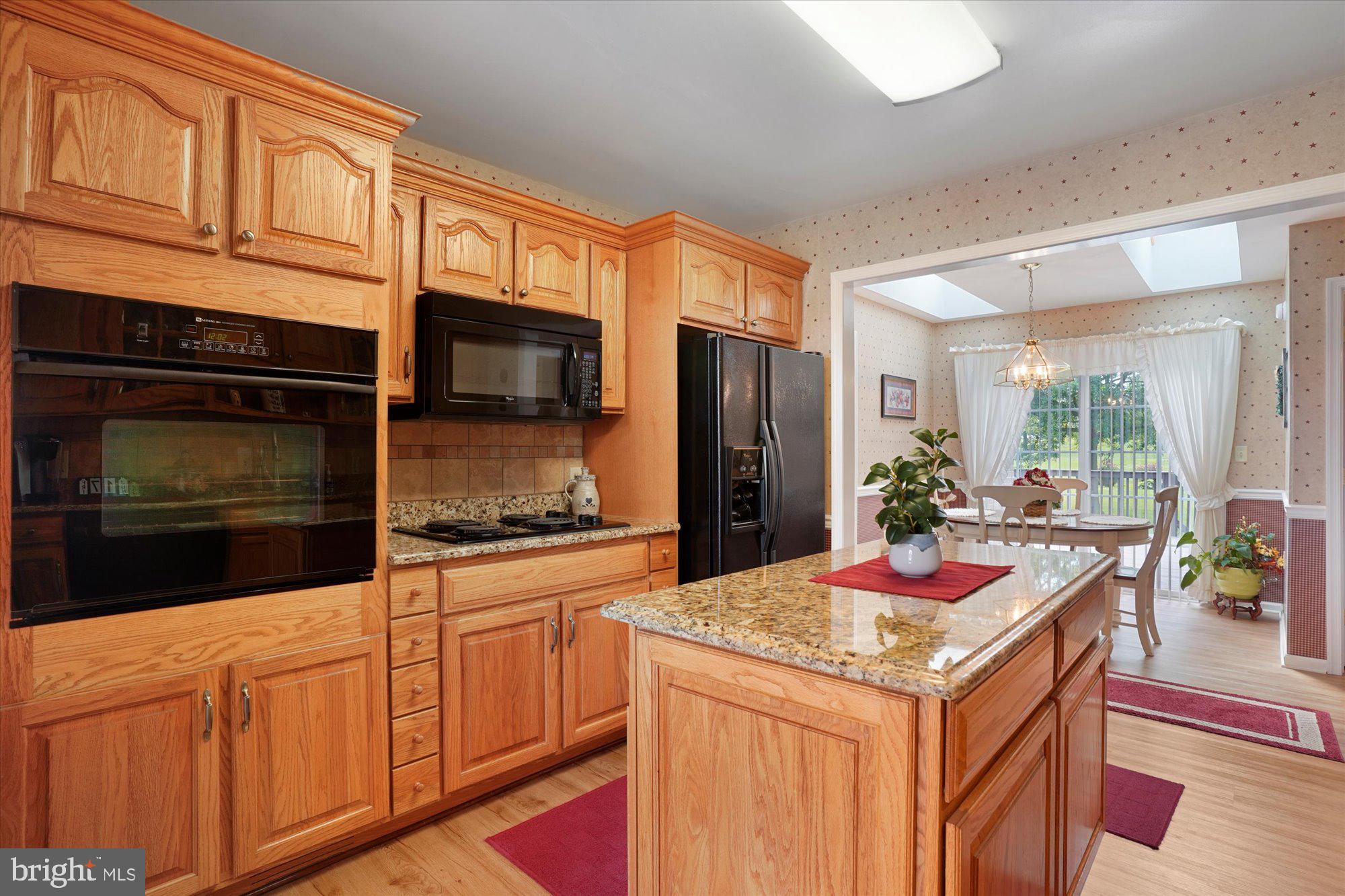 1445 Ebenezer Church Road Rising Sun, MD 21911 - Photo 12 of 40 Ceramic Tile Backsplash & adjacent Breakfast Area