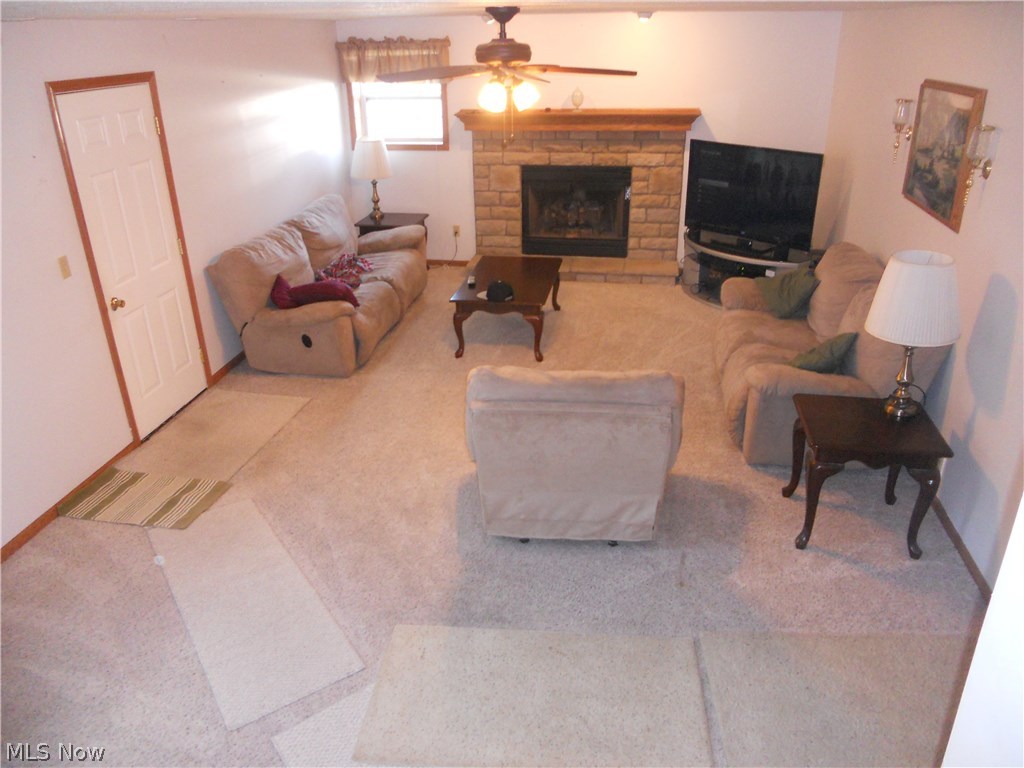 41821 Whitney Road Lagrange, OH 44050 - Photo 5 of 25 Family room & gas fireplace